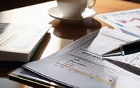 Investor analyzing charts mastering fundamental analysis